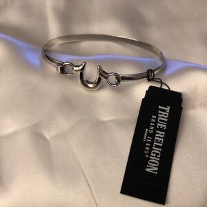 True Religion Polished Silver Tone Bangle With Horseshoe Logo Accent OS NWT